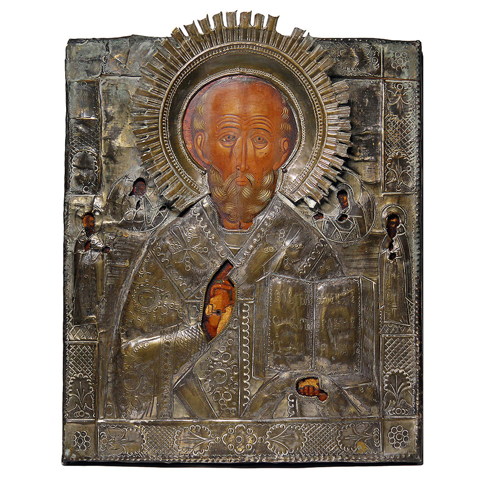Cтаринная икона святой Николай Чудотворец в посеребренном латунном окладе. Россия 19 век