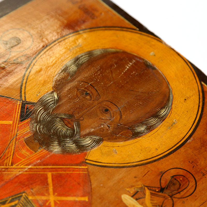 Cтаринная икона святой Николай Чудотворец в латунном посеребренном окладе. Россия 19 век.