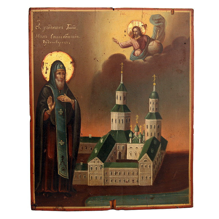 Старинная икона Святой угодник Божий преподобный Нил Столбенский Чудотворец на фоне Нило-Столобенского монастыря, в посеребренном окладе.