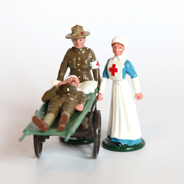 Набор оловянных солдатиков. Санитар и сестра милосердия армии США и раненый на носилках времен Первой Мировой Войны.