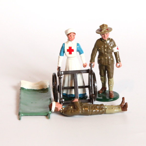 Набор оловянных солдатиков. Санитар и сестра милосердия армии США и раненый на носилках времен Первой Мировой Войны.
