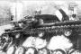 Подбитый танк Pz.Kpfw III с эмблемой 502-го тяжелого танкового батальона, Ленинградский фронт, зима 1942-43 гг.